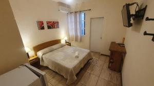 Postel nebo postele na pokoji v ubytování Hotel Viola