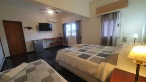 Postel nebo postele na pokoji v ubytování Hotel Viola