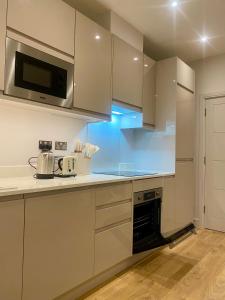 Een keuken of kitchenette bij Modern & Luxury Flat