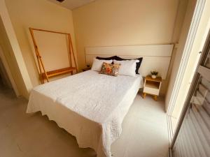 En eller flere senge i et værelse på Recanto Solar do Moçambique