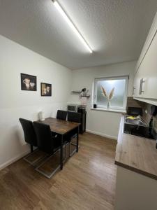 Η κουζίνα ή μικρή κουζίνα στο Ferienwohnung Aspelohe - Apartment 1