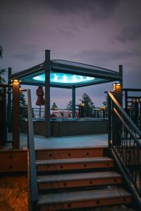 a gazebo with lights on top of it at Coyote Bluff Estate in Somers