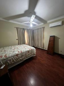 Postel nebo postele na pokoji v ubytování Apartamento malecon de Puerto Plata