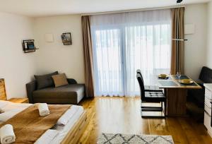 Postel nebo postele na pokoji v ubytování R&K Classic Spirit Mariazell