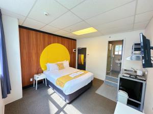 Kuchyň nebo kuchyňský kout v ubytování Wellington Hotel