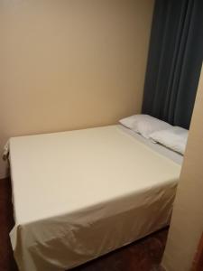 Postel nebo postele na pokoji v ubytování Laguno Hostel and Guest House