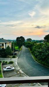 a car parked on the side of a street at MM’s Place at Woodhills Tagaytay in Tagaytay