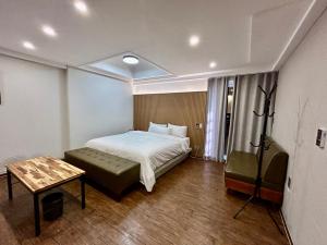 Postel nebo postele na pokoji v ubytování Series hotel