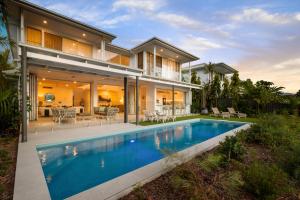 Bazén v ubytování Escape Villas Port Douglas nebo v jeho okolí