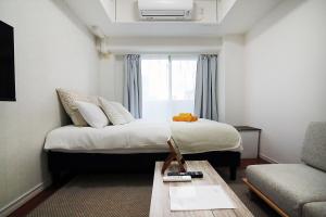 En eller flere senge i et værelse på SQ) SHIBUYA HOUSE