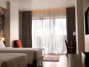 Dusit Princess Kathmandu客房内的一张或多张床位