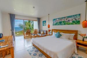 Ein Bett oder Betten in einem Zimmer der Unterkunft Camia Resort & Spa
