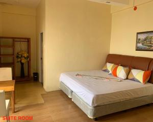 Postel nebo postele na pokoji v ubytování Hana Natsu Resorts Beach & Hotel
