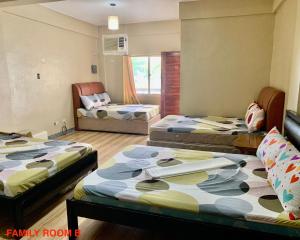 Postel nebo postele na pokoji v ubytování Hana Natsu Resorts Beach & Hotel