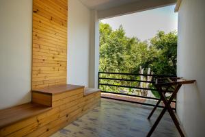 Balkón nebo terasa v ubytování Tamnanpar Resort