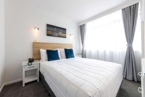 Postel nebo postele na pokoji v ubytování Aarangi Motel