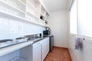 Kuchyň nebo kuchyňský kout v ubytování Aarangi Motel