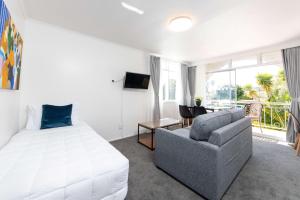 Postel nebo postele na pokoji v ubytování Aarangi Motel