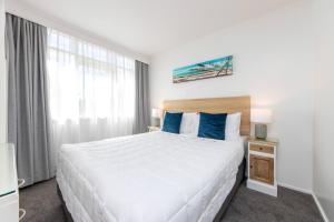 Postel nebo postele na pokoji v ubytování Aarangi Motel