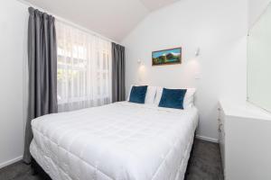 Postel nebo postele na pokoji v ubytování Aarangi Motel