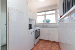 Kuchyň nebo kuchyňský kout v ubytování Aarangi Motel