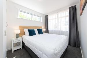 Postel nebo postele na pokoji v ubytování Aarangi Motel