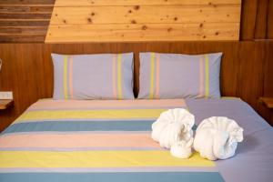 Postel nebo postele na pokoji v ubytování Tamnanpar Resort