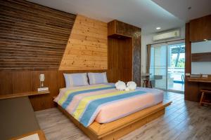 Postel nebo postele na pokoji v ubytování Tamnanpar Resort