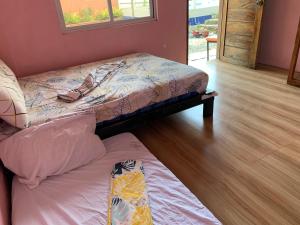 Postel nebo postele na pokoji v ubytování Hana Natsu Resorts Beach & Hotel