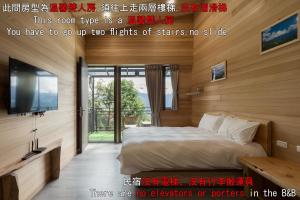 清境木木杉阿彬民宿客房内的一张或多张床位