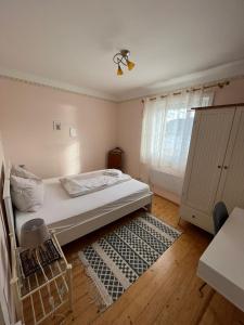 Postel nebo postele na pokoji v ubytování Haus Seeblick
