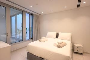 Postel nebo postele na pokoji v ubytování City Napa Seaview Villas - Villa 8