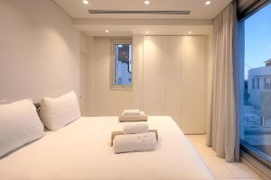 Postel nebo postele na pokoji v ubytování City Napa Seaview Villas - Villa 8