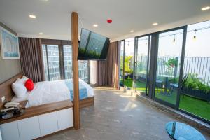 TV a/nebo společenská místnost v ubytování Lake View Hotel