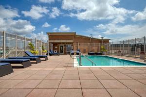 a pool on the roof of a building at Foggy Bottom 1BR w Gym Pool DM nr World Bank WDC-163 in Washington, D.C.