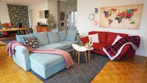 A seating area at Your comfortable apartment in Dusseldorf city