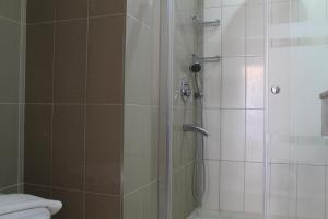 Ванная комната в Ida Hotel