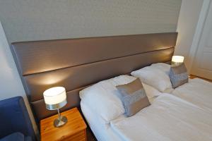 Postel nebo postele na pokoji v ubytování Apartman Brigitte Bükfürdő + 37 fotografií