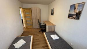 A bed or beds in a room at 3 room Apartment, free parking, Liptovský Mikuláš