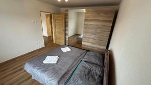 A bed or beds in a room at 3 room Apartment, free parking, Liptovský Mikuláš