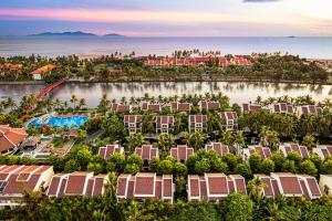 an aerial view of a resort near the ocean at Koi Resort & Spa Hoi An in Hoi An
