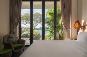 Ένα ή περισσότερα κρεβάτια σε δωμάτιο στο Abogo Villa Nha Trang Ocean View +269 φωτογραφίες