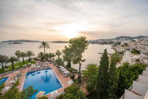 an aerial view of a resort with a body of water at THB Los Molinos - Adults Only in Ibiza Town +56 photos