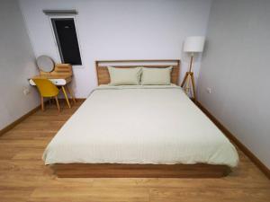 Кровать или кровати в номере บ้านฮักหอม