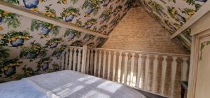 Posteľ alebo postele v izbe v ubytovaní Charmant logement dans un écrin de verdure