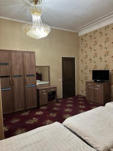 Posteľ alebo postele v izbe v ubytovaní Hello Dushanbe Guest House