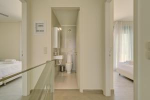 Ванная комната в Ouzo Panoramic Houses 1, with private pool