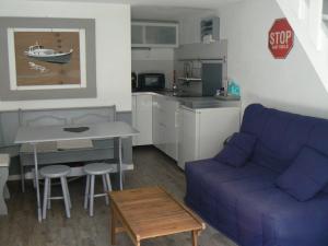 Kuchyň nebo kuchyňský kout v ubytování Un p'tit coin de paradis avec jacuzzi