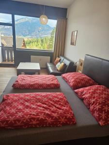 Postel nebo postele na pokoji v ubytování Dachstein Blick