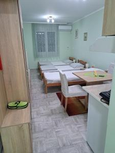 Η κουζίνα ή μικρή κουζίνα στο MIMA apartmani